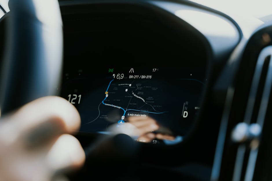 Close-up view of a car dashboard showing a GPS navigation screen in use.